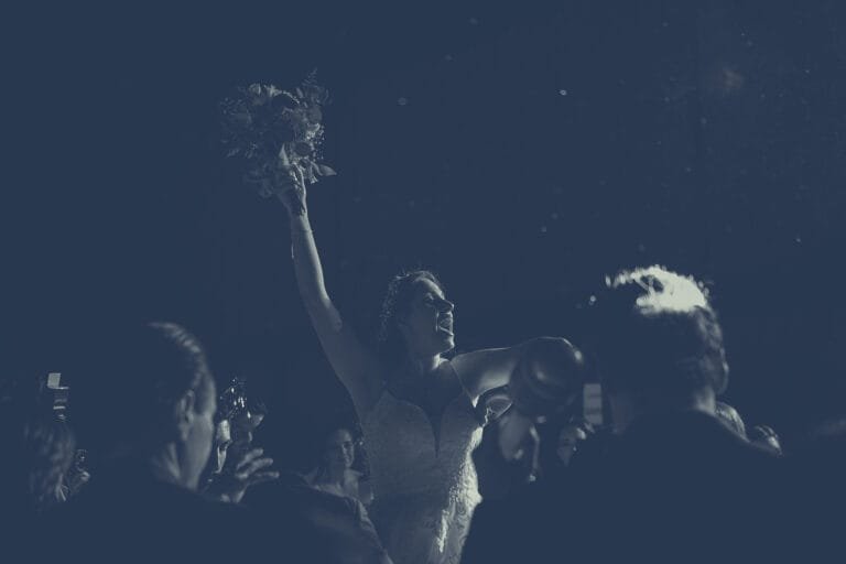 Bride tossing her bouquet