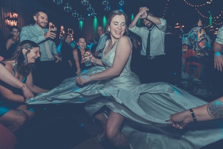 Bride dancing, gown flying