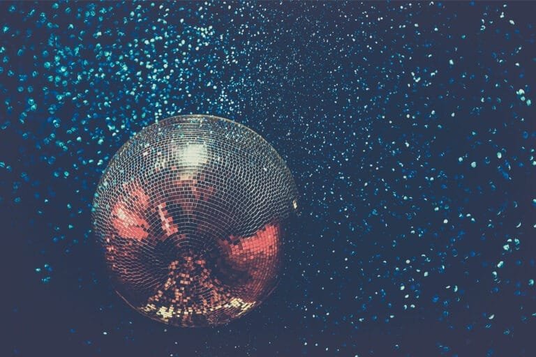 Mirror ball over a packed dance floor